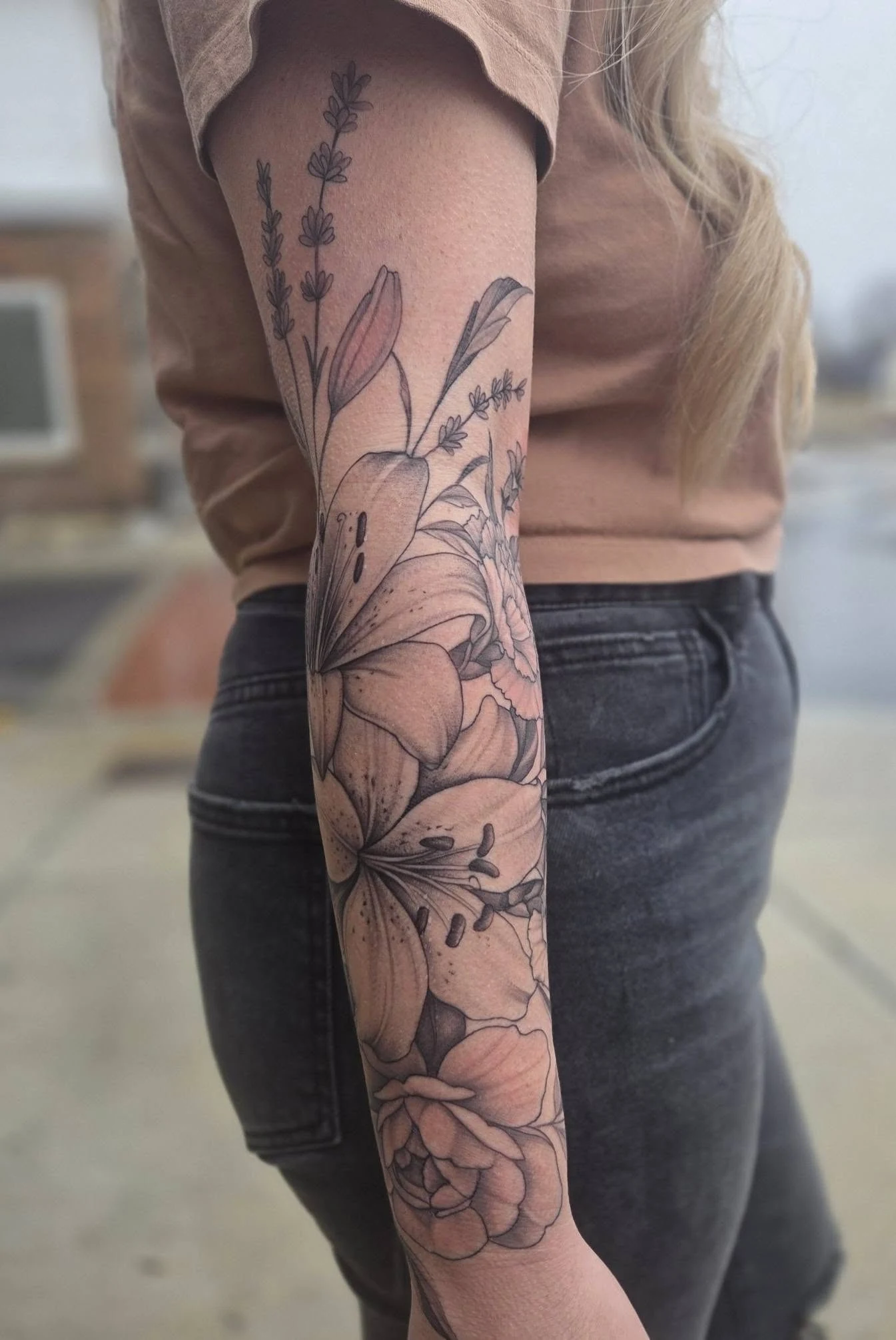 Floral arm tattoo